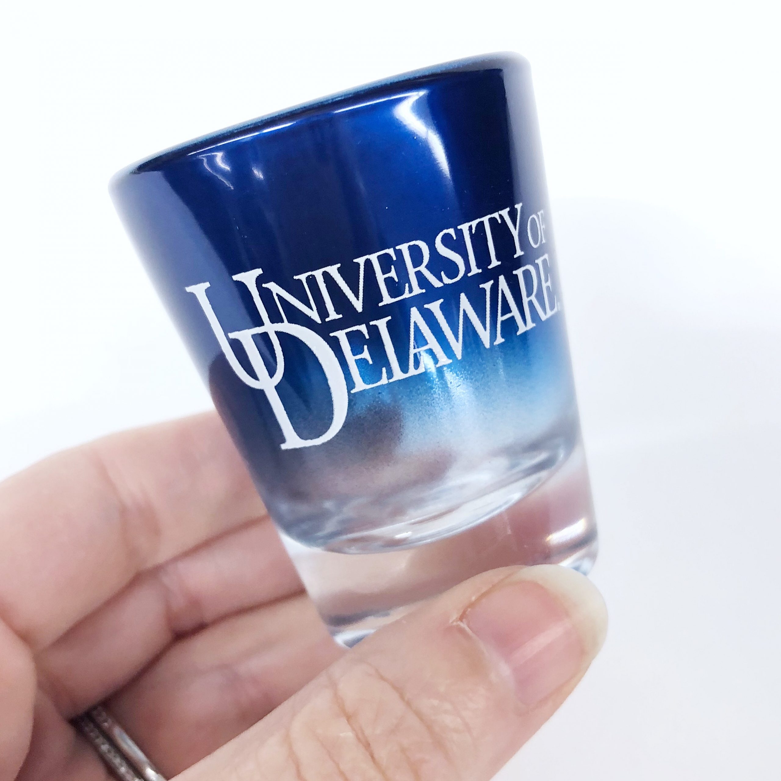 https://www.national5and10.com/wp-content/uploads/2018/03/University-of-Delaware-Blue-Mirrored-Shot-Glass-1-scaled.jpg